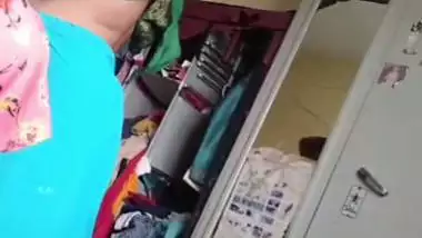 Grandmother wearing blouse and showing naked boobs