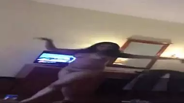 Young college girl stripping dance for client